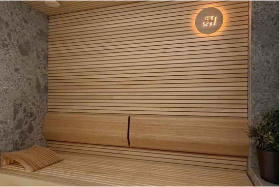 Sauna con acabado de madera y piedra - Saunas